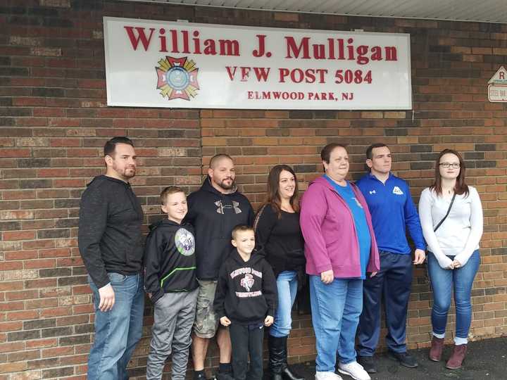 Kathryn Mulligan is flanked by sons Tom, Pat, Billy, daughter-in-law Linda, and grandchildren Matty, Biily Jr. and Kayla.