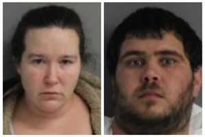 Man, Woman Charged For Double Homicide At Home In Area