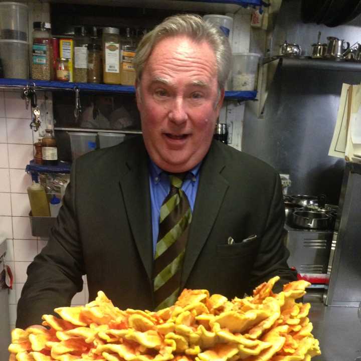 Peter&#x27;s brother, Ned Kelly, holding a locally sourced chicken mushroom.