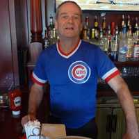 <p>Nellie&#x27;s Place bartender, Sandy, serving up a bar pie. </p>