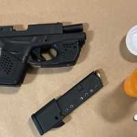 <p>The gun and pills seized.</p>