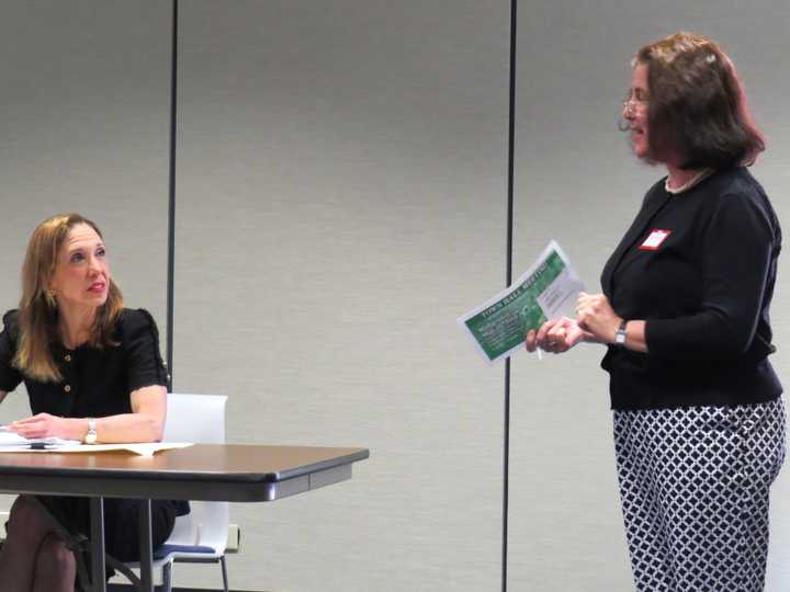 Assembly person Amy Paulin listens to concerns from an Eastchester resident at the meeting.