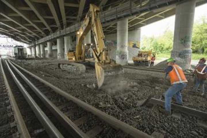 Construction crews have replaced one of the two tracks damaged in Friday&#x27;s accident on the Fairfield-Bridgeport border. The second is expected to be finished Tuesday night.