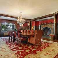 <p>The fireplace in a great room being used as a dining room has a five-foot arch.</p>