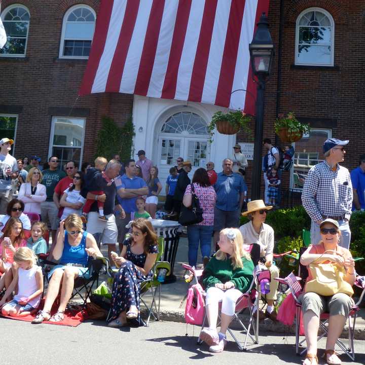 Spectators watch Monday&#x27;s Memorial Day parade in front of Ridgefield Town Hall.