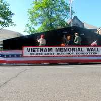 <p>This float commemorates the Vietnam Memorial Wall and the soldiers lost in that war. </p>