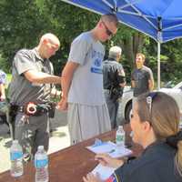 <p>Cortlandt Manor volunteer Dylan Stewart is &quot;arrested and processed&quot; during the annual Westchester County Mutual Aid exercise at Valhalla&#x27;s Westchester Community College. </p>