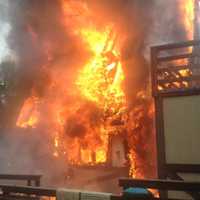 <p>Firefighters responded to a house fire at 202 Steep Hill Road in Weston on Thursday.</p>