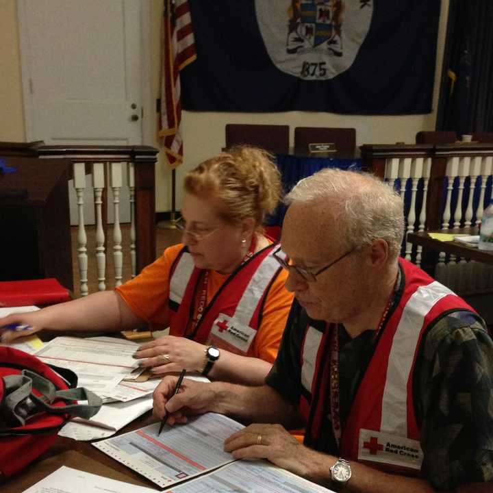 American Red Cross Volunteers Fred and Nancy Stein, of Chappaqua, and three other volunteers assisted the 15 people displaced by the June 24 fire in Mount Kisco. 