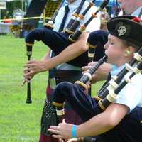 <p>One of the young bag pipers at the 90th annual Scottish Round Hill Highland Games at Cranbury Park in Norwalk.</p>