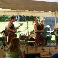 <p>Festive Scottish music under the tent Saturday at the Round Hill Highland Games at Cranbury Park in Norwalk.</p>