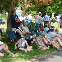 <p>Some attendees sought shade Saturday at the 90th annual Round Hill Highland Games at Cranbury Park in Norwalk.</p>