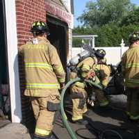 <p>New Canaan Fire Company puts out a blaze at AC Auto Body &amp; Mechanic at about 5 p.m. Monday.</p>