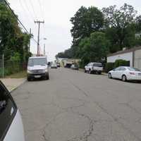 <p>Marbledale Road in Tuckahoe is lined with parked cars on both sides of the street.</p>