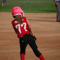 <p>Molly Meehan rounds first after her hit in Fairfields 7-0 victory over Seymour. </p>