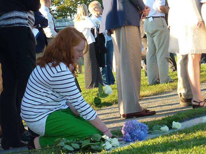 Family and friends of people who died in the Sept. 11, 2001, terrorist attacks gather at the state&#x27;s 9/11 Memorial at Sherwood Island State Park in Westport during last year&#x27;s ceremony.