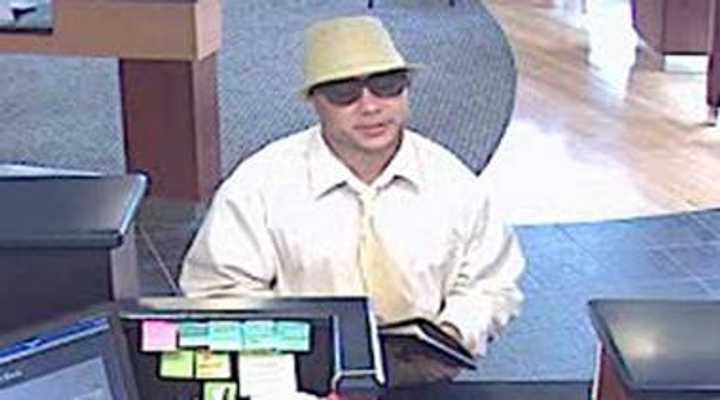 This is a surveillance camera photo of the suspect in the bank robbery in Greenwich. 