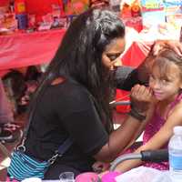 <p>A local girl gets her face painted at Yonkers Riverfest. </p>