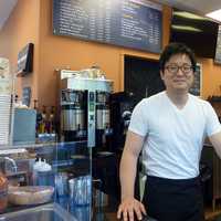 <p>Ridgefield resident Han Lee owns Coffee Story, a new coffee shop and cafe in Wilton.</p>