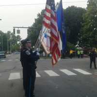 <p>The members of the Danbury Police Honor Guard carry the flags at Wednesday&#x27;s memorial service. </p>