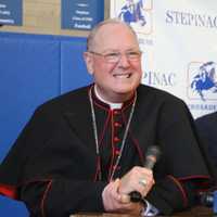 <p>Cardinal Dolan gives a press conference after his mass at  Archbishop Stepinac High School</p>