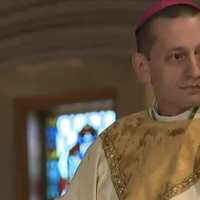 <p>Bishop Frank J. Caggiano takes his place at the front of St. Theresa Roman Catholic Church in Trumbull before the Mass begins. </p>