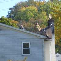 <p>Investigators search for possible victims in Elmsford following a fire Saturday night.</p>