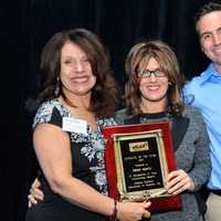 <p>Carol Christiansen, HGAR Awards Committee Chair present the Affiliate of the Year Award to Irene Amato of ASAP Mortgage. Mark Aakjar of Marks Inspections, won 2012 HGAR Affiliate of the Year award.</p>