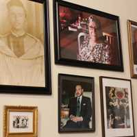 <p>Pictures of Moroccan kings and family members line the walls of the distillery.</p>