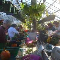 <p>Women learn how to make Thanksgiving centerpieces at Lasdon Park in Somers. </p>