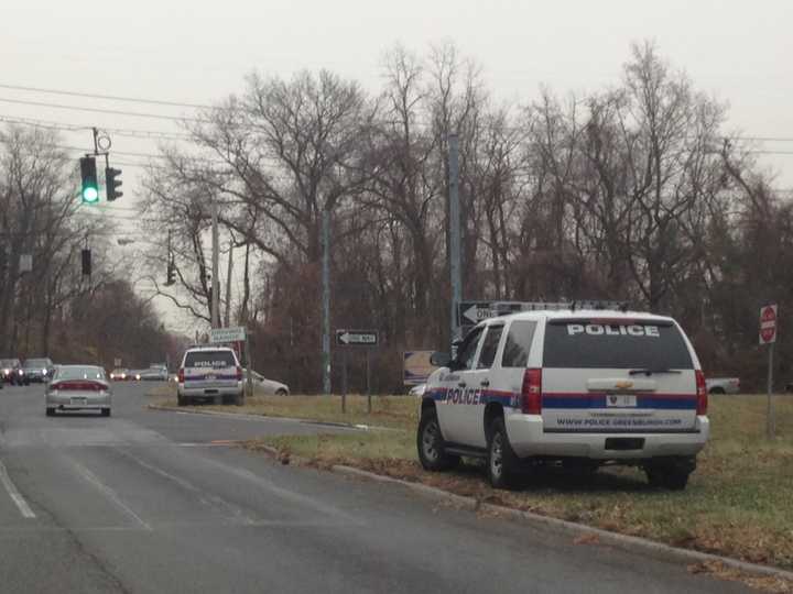 Police vehicles on the scene at the entrance to the northbound Sprain Brook Parkway at Jackson Avenue in Yonkers.