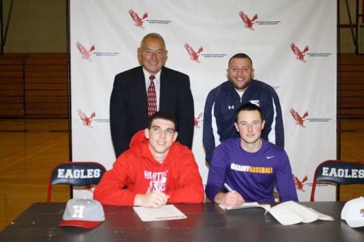 Infielders Mike Milo and Nick Campana sign their letters of intent with Coach Dom Cecere and Athletic Director Jason Karol.
