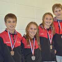 <p>Whirlwind&#x27;s 12-13 year-old divers take the medal stand. Left to right are Kevin Bradley, Anne Farley, Claire Ross, Owen Stevens and Wiley Schmidt.</p>