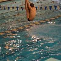 <p>Darien Diver Timothy Luz shows perfect pike form.</p>