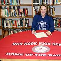 <p>Julianne Wilkinson signing her letter of intent to go to Concordia.</p>