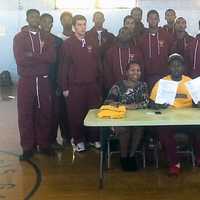 <p>New Jersey basketball star Elijah Brown signing his letter of commitment to attend Concordia College.</p>