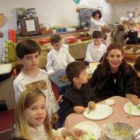 <p>Students at CCK Preschool prepare for their annual Thanksgiving feast. Pictured here: Mrs. Janine Gordon with left to right Heather Martinsen, Tyler Sallaberry, Oliver Browning, Michela Guccione background Nolan Queenan, and Max Malagisi</p>