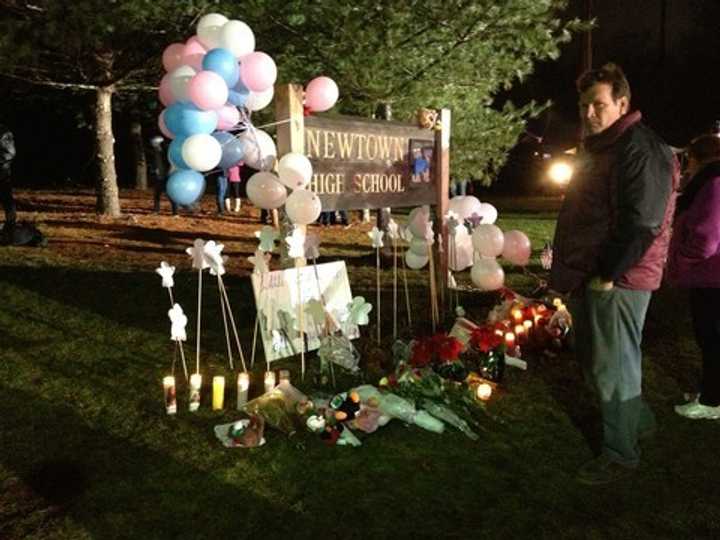 Hundreds turned out at Newtown High School as President Barack Obama came to pay respects to victims&#x27; families shortly after the Dec. 14, 2012 tragedy.