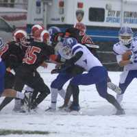 <p>Darien&#x27;s John Reed finds running room against New Canaan.</p>