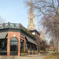 <p>A simple bunting of evergreens and red ribbons, plus some well-placed wreaths, give a festive air to the Simon Pearce store in Greenwich. </p>