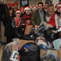 <p>Greg Ball, seen here donating clothes to the Montrose VA Hospital in Cortlandt, said 2013 was a great year for Team Ball.</p>