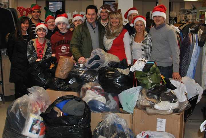 Greg Ball, seen here donating clothes to the Montrose VA Hospital in Cortlandt, said 2013 was a great year for Team Ball.