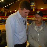 <p>Slam Dunk founder Lou DeMello, right, during Friday&#x27;s games at the County Center.</p>