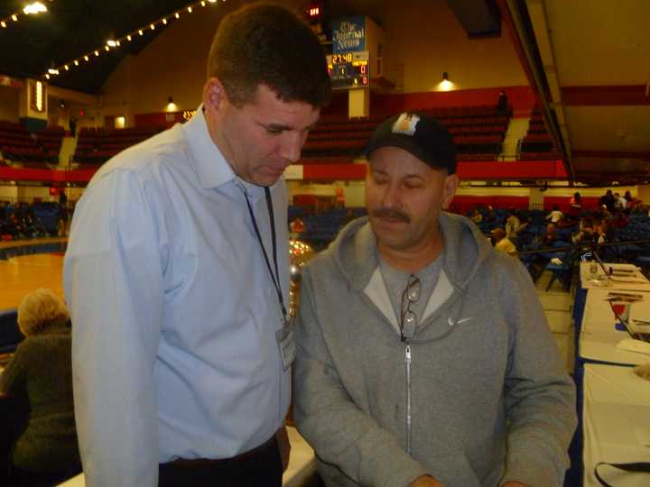 Slam Dunk founder Lou DeMello, right, during Friday&#x27;s games at the County Center.