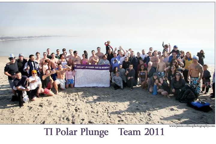 Frigid Plunge At Westport's Compo On New Year's Day Benefits Make A Wish