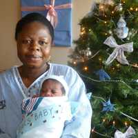 <p>Mother Respy Okang and her New Year&#x27;s baby boy Andrew at St. John&#x27;s Riverside Hospital.</p>