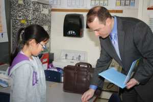 Eastchester Author, Parent Signs Books At Anne Hutchinson School