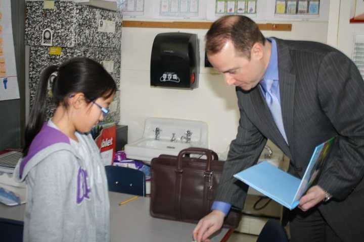 Eastchester Author, Parent Signs Books At Anne Hutchinson School