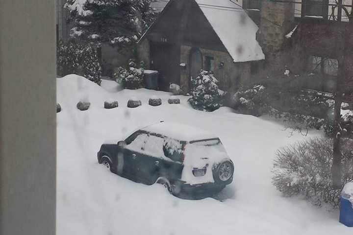 Cars were covered with another several inches of snow and then sleet and rain.