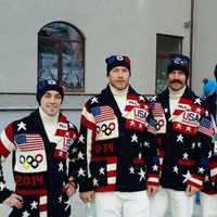 <p>Lugers Jayson Terdiman and Tucker West, far right, pose with skiers Bode Miller, TJ Lanning and Jared Goldberg before the opening ceremonies begin. </p>